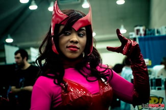 Cosplay makers in pink superhero Halloween costume