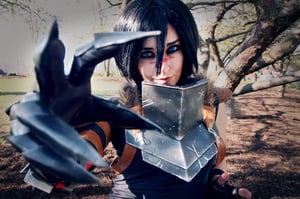Cosplay maker showing off armor and claws cosplay