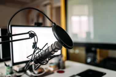 Microphone and laptop set up for maker podcast recording